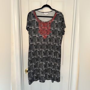 Light-weight above the knee dress with pockets.